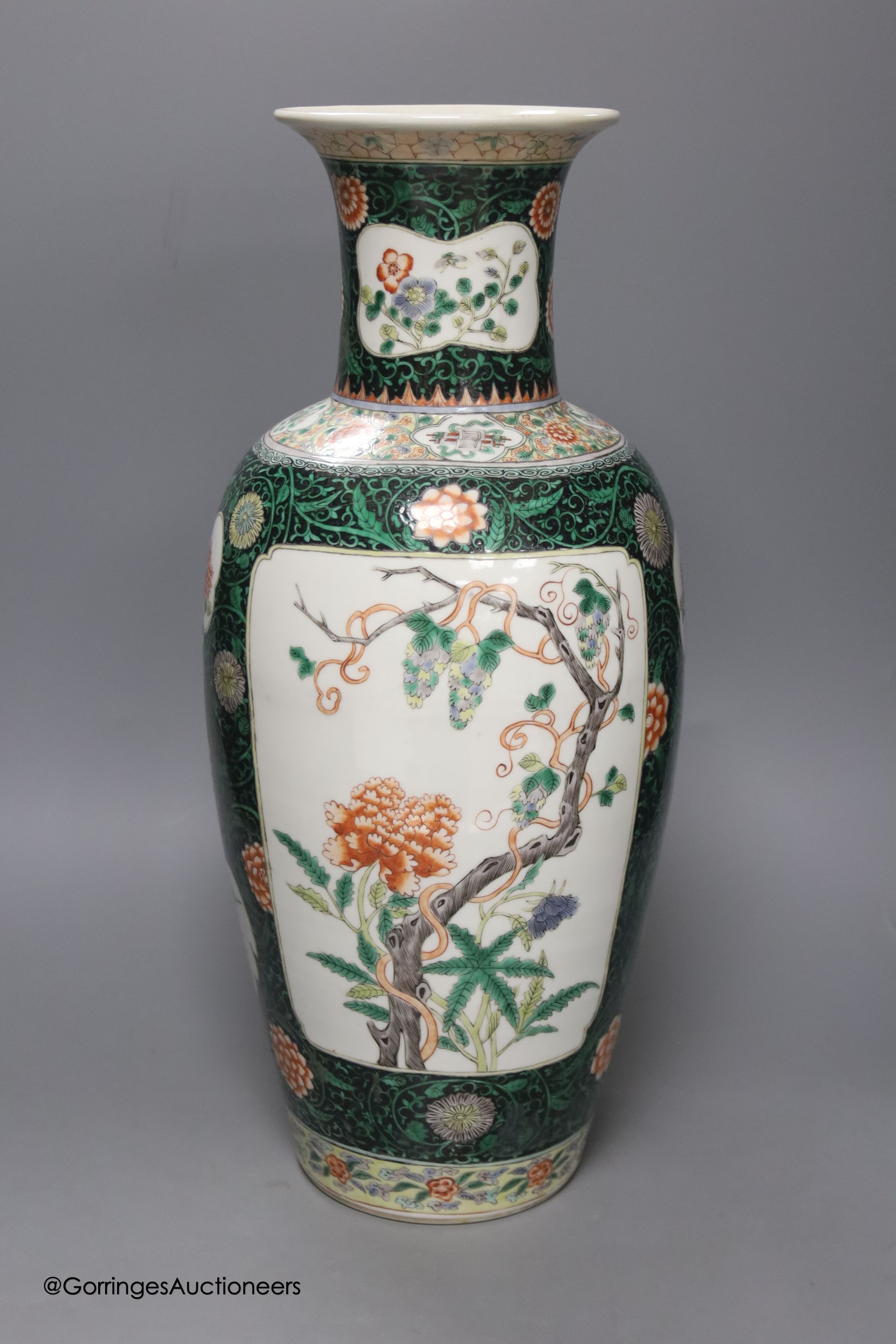 A large 19th century Chinese famille noire vase, height 46cm, restored neck